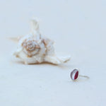 Sterling silver ultra rare red and white multi coloured sea glass ring with shell in background